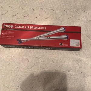 Digital air drumsticks and MTV mic as added bonus